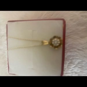 Beautiful Diamond Chip Necklace. This is a 10 it real gold and Diamond pendant
